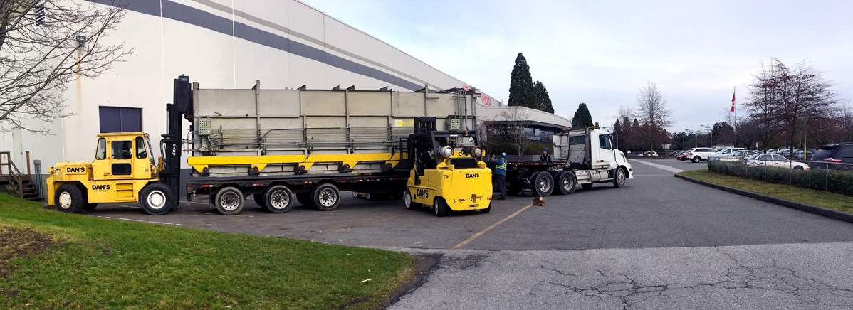 Coast Industrial forklifts loading fabricated steel for delivery