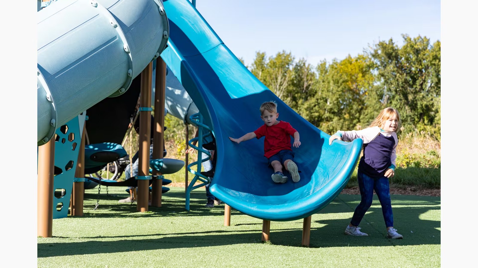 Children going down the big slide