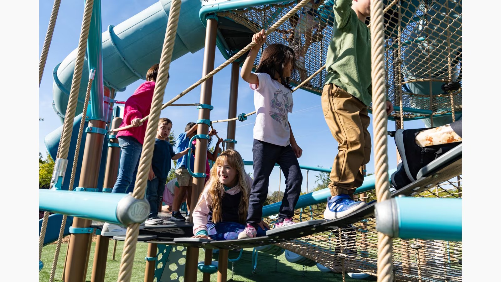 Children crossing the rope bridge