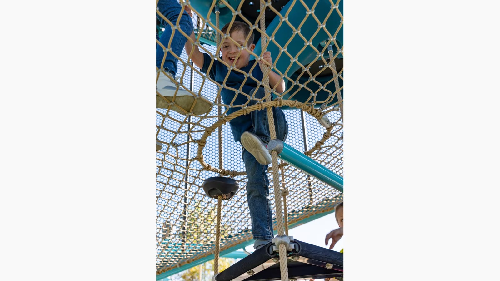 A child climbing the net tower