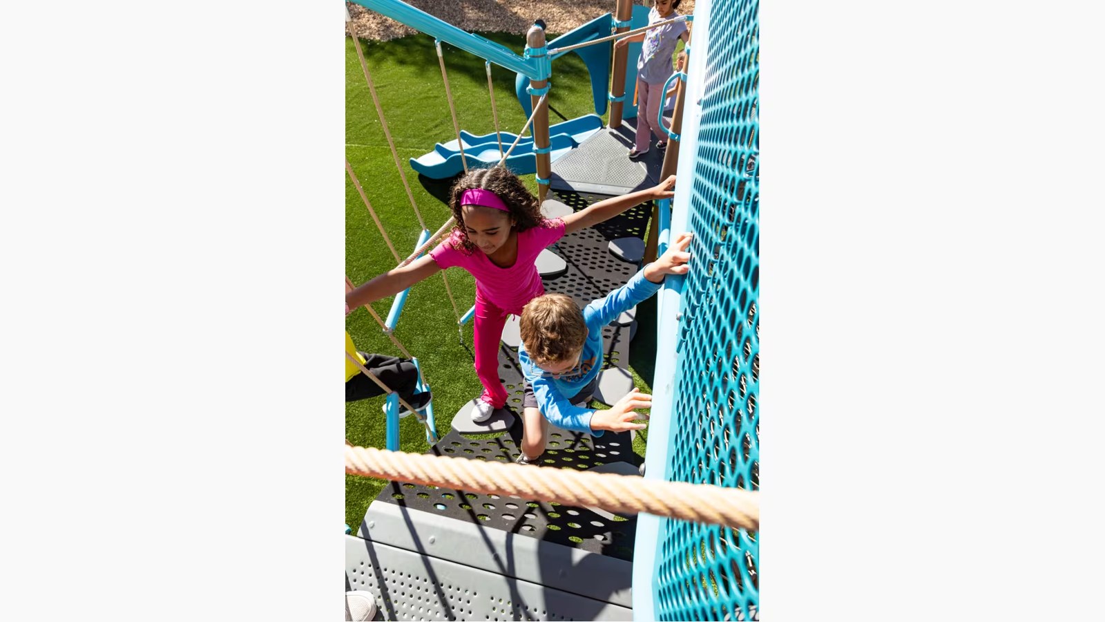 Children climbing the net structure